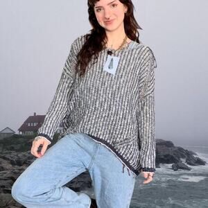 Cream and navy striped sweater with seashell patch